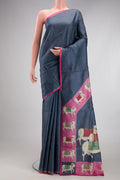 Grey Tussar Silk Saree with Embroidery on the body and Embroidery Border.  displayed on a mannequin