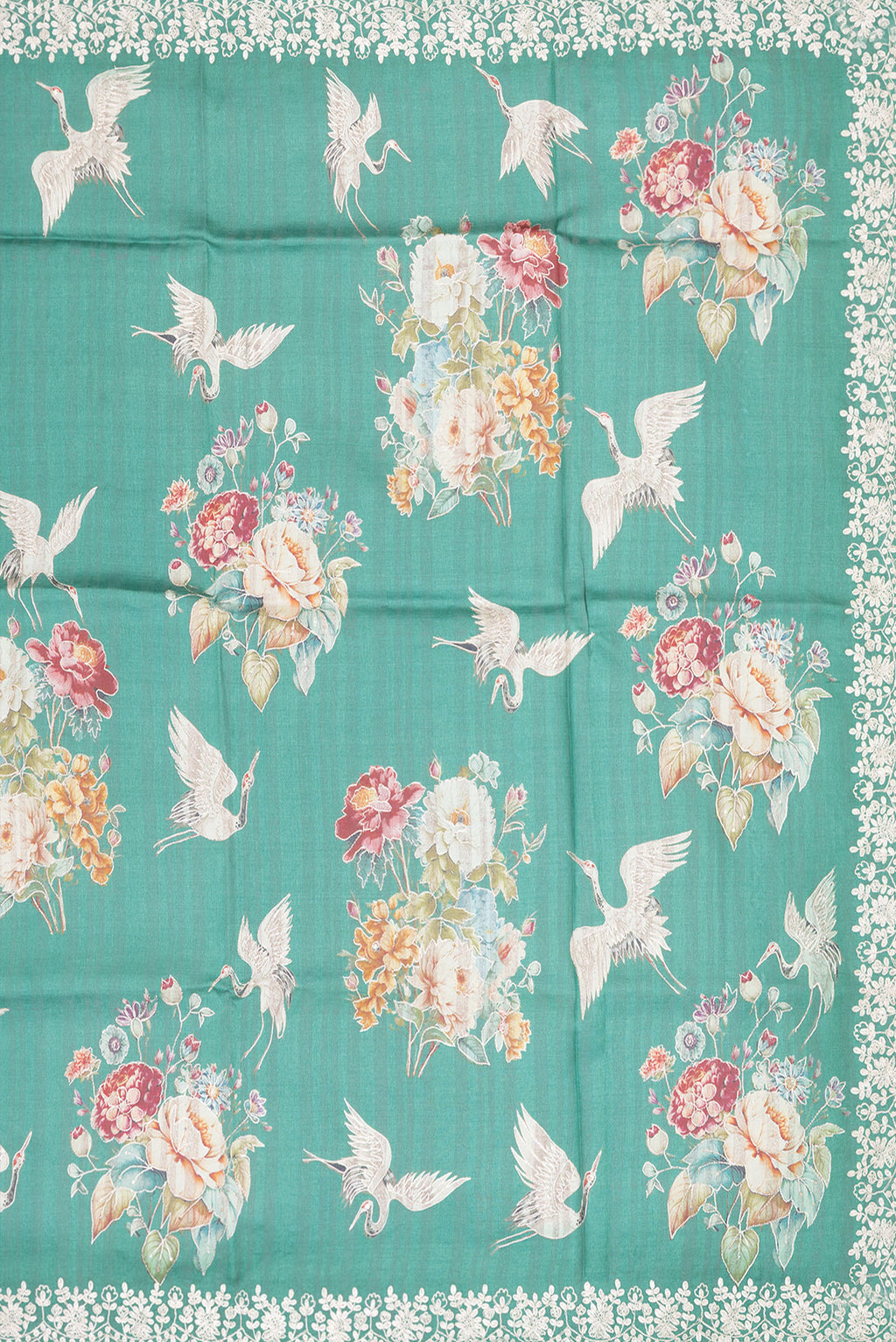 Close up image of the pallu of Green Tussar Silk Saree with Embroidery on the body and Embroidery Border. 