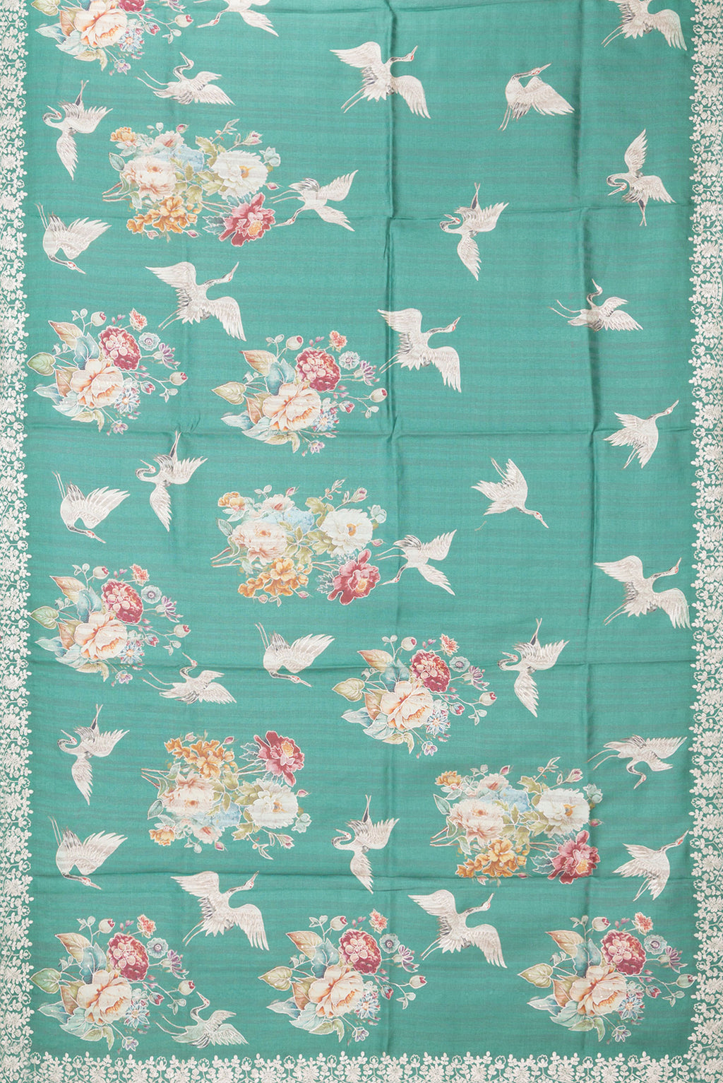Flat view of Green Tussar Silk Saree with Embroidery on the body and Embroidery Border. 