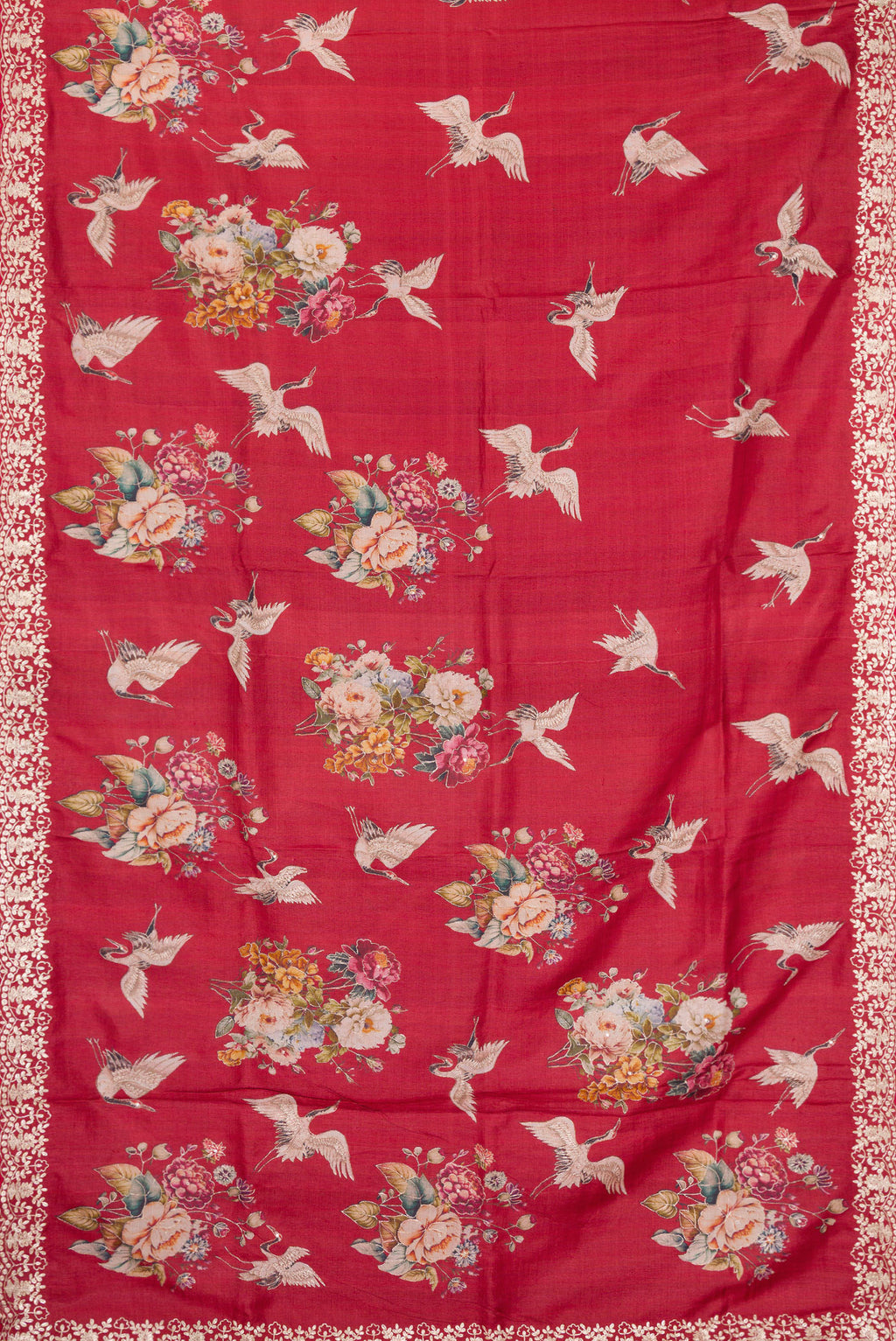 Flat view of Maroon Tussar Silk Saree with Embroidery on the body and Fancy Border. 