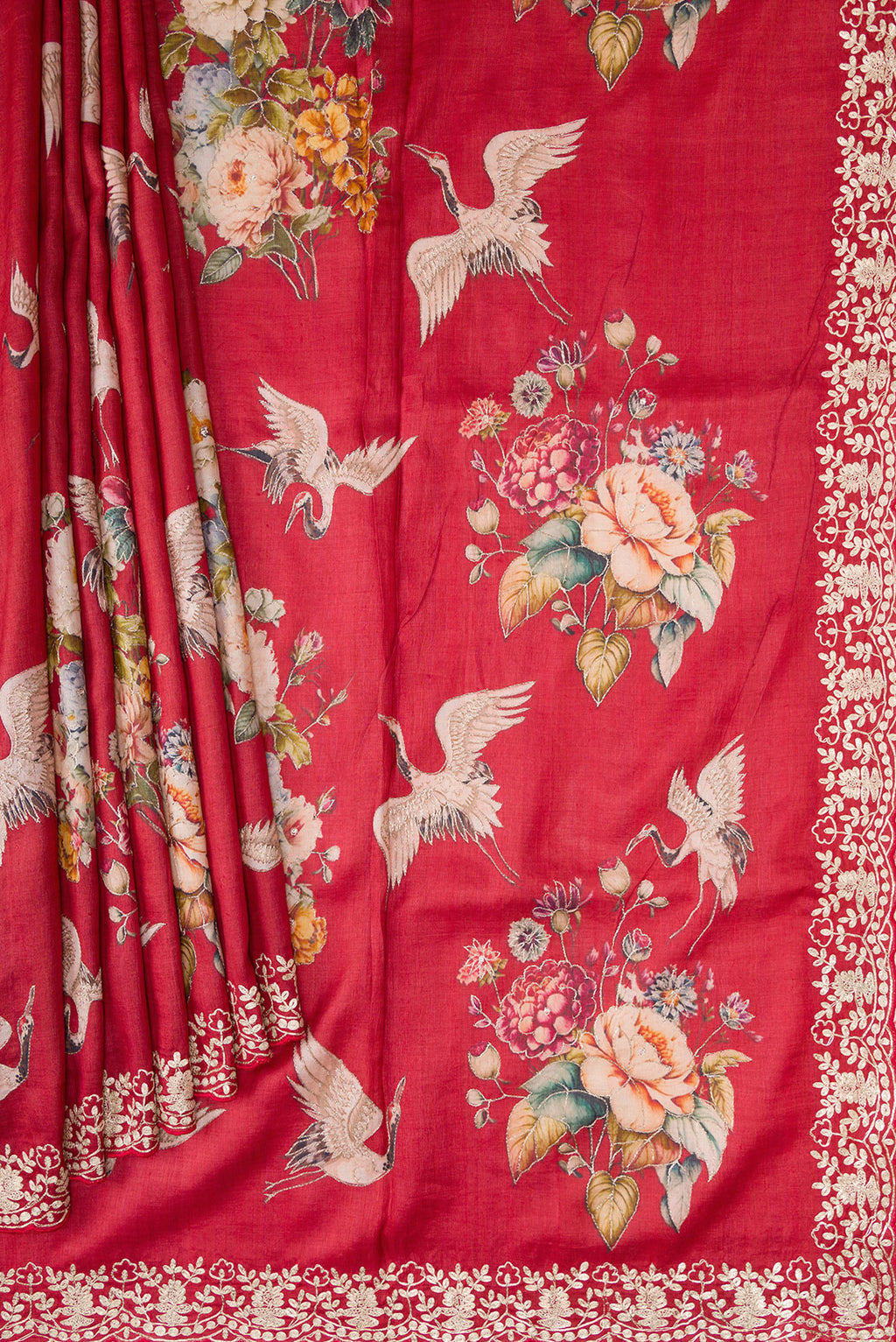 Pleats and pallu of Maroon Tussar Silk Saree with Embroidery on the body and Fancy Border. 