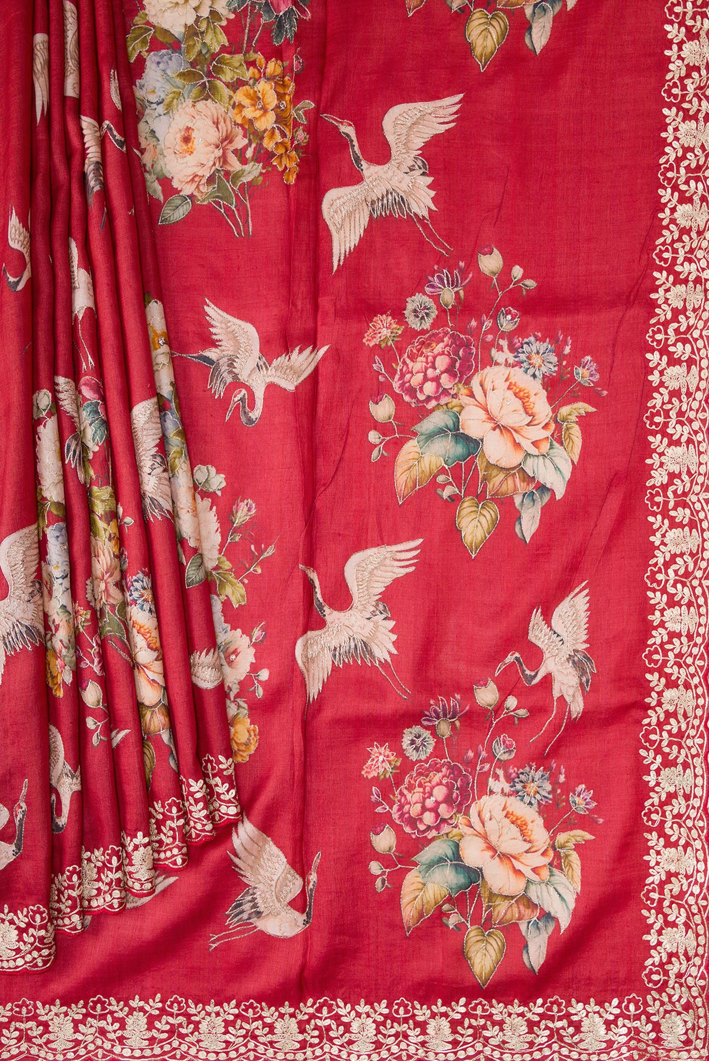 Pleats and pallu of Maroon Tussar Silk Saree with Embroidery on the body and Fancy Border. 
