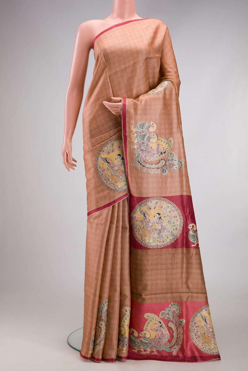 Beige Tussar Silk Saree with Checked design on the body and Embroidery Border.  displayed on a mannequin