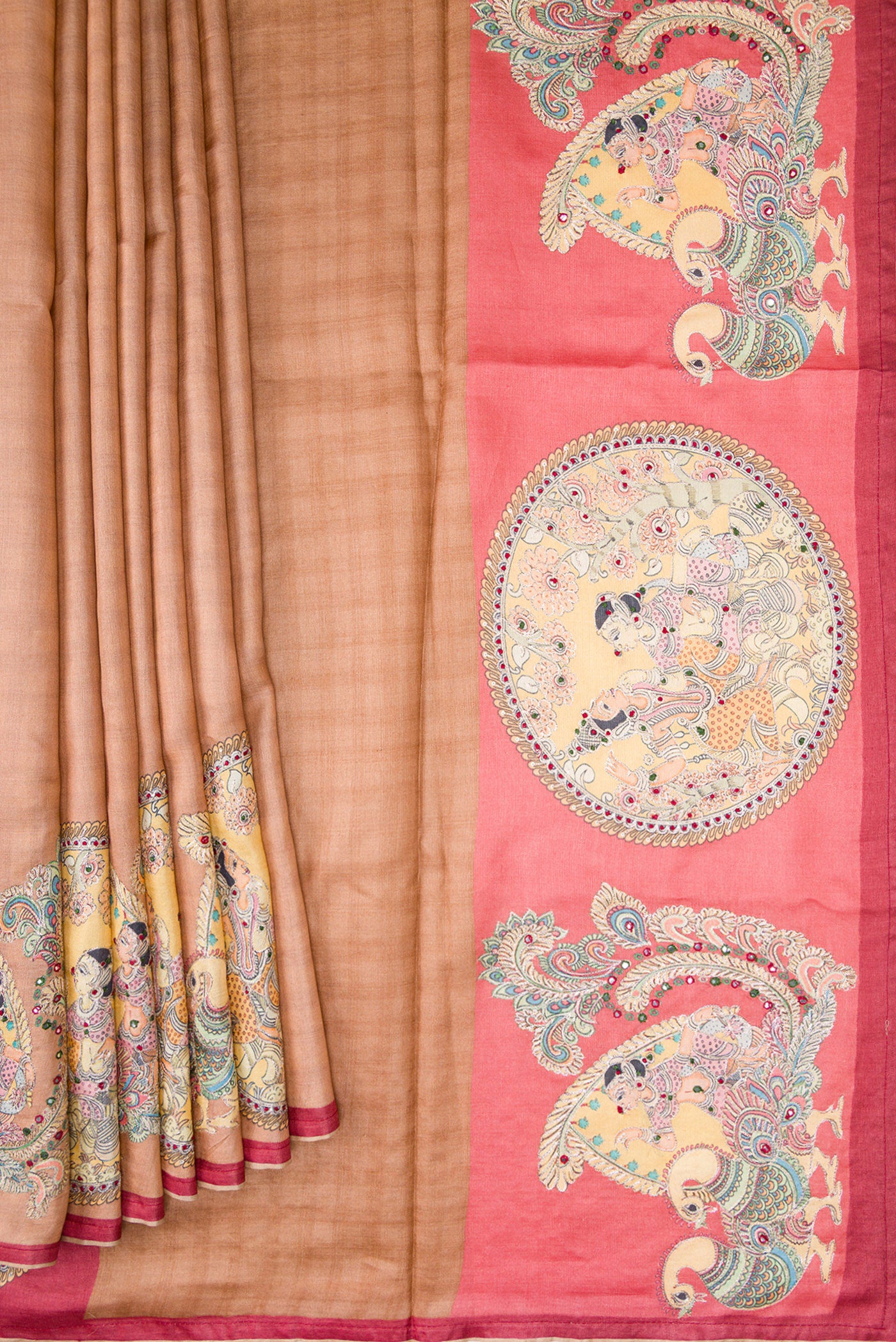 Pleats and pallu of Beige Tussar Silk Saree with Checked design on the body and Embroidery Border. 