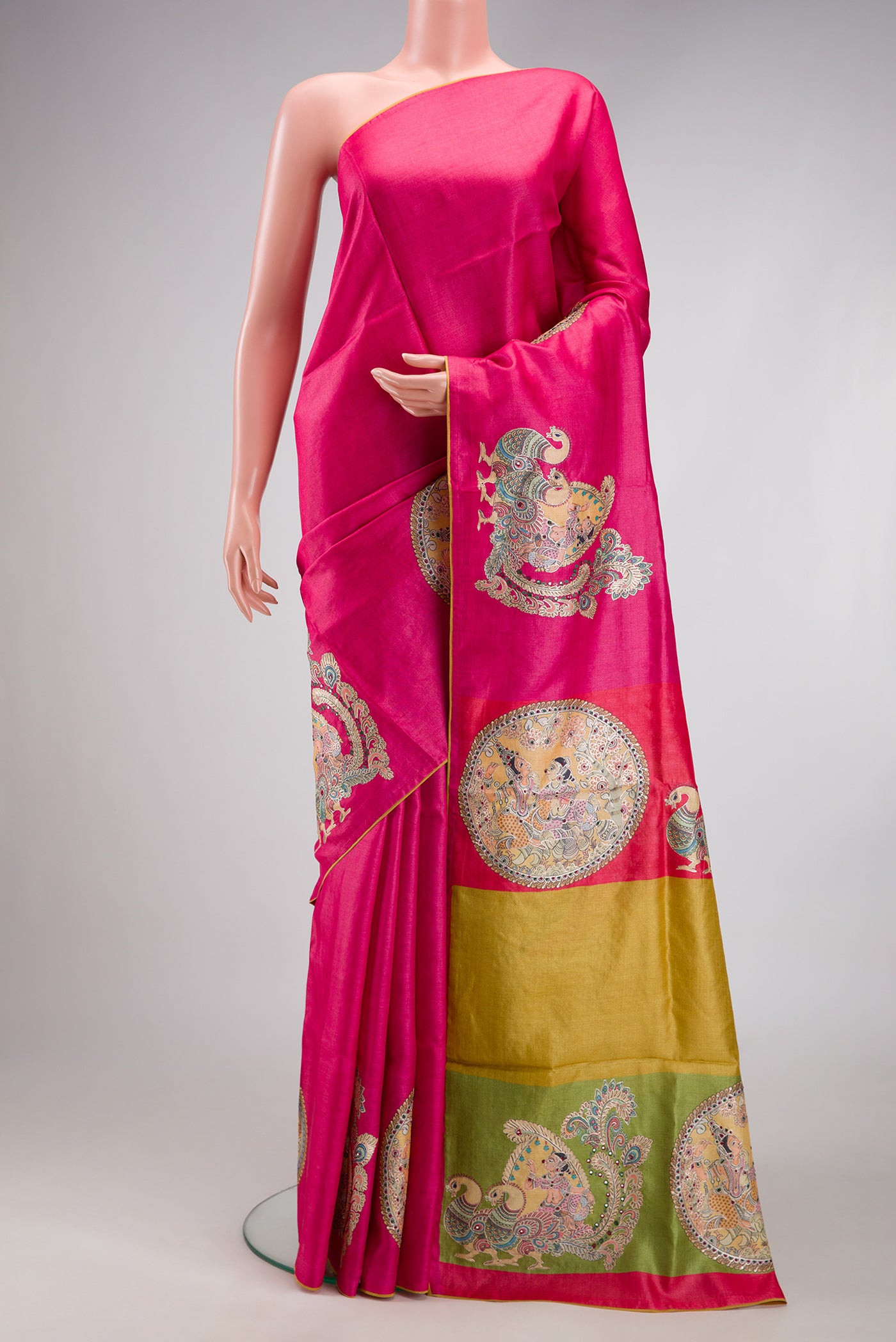 Pink Tussar Silk Saree with Plain Body and Embroidery Border.  displayed on a mannequin