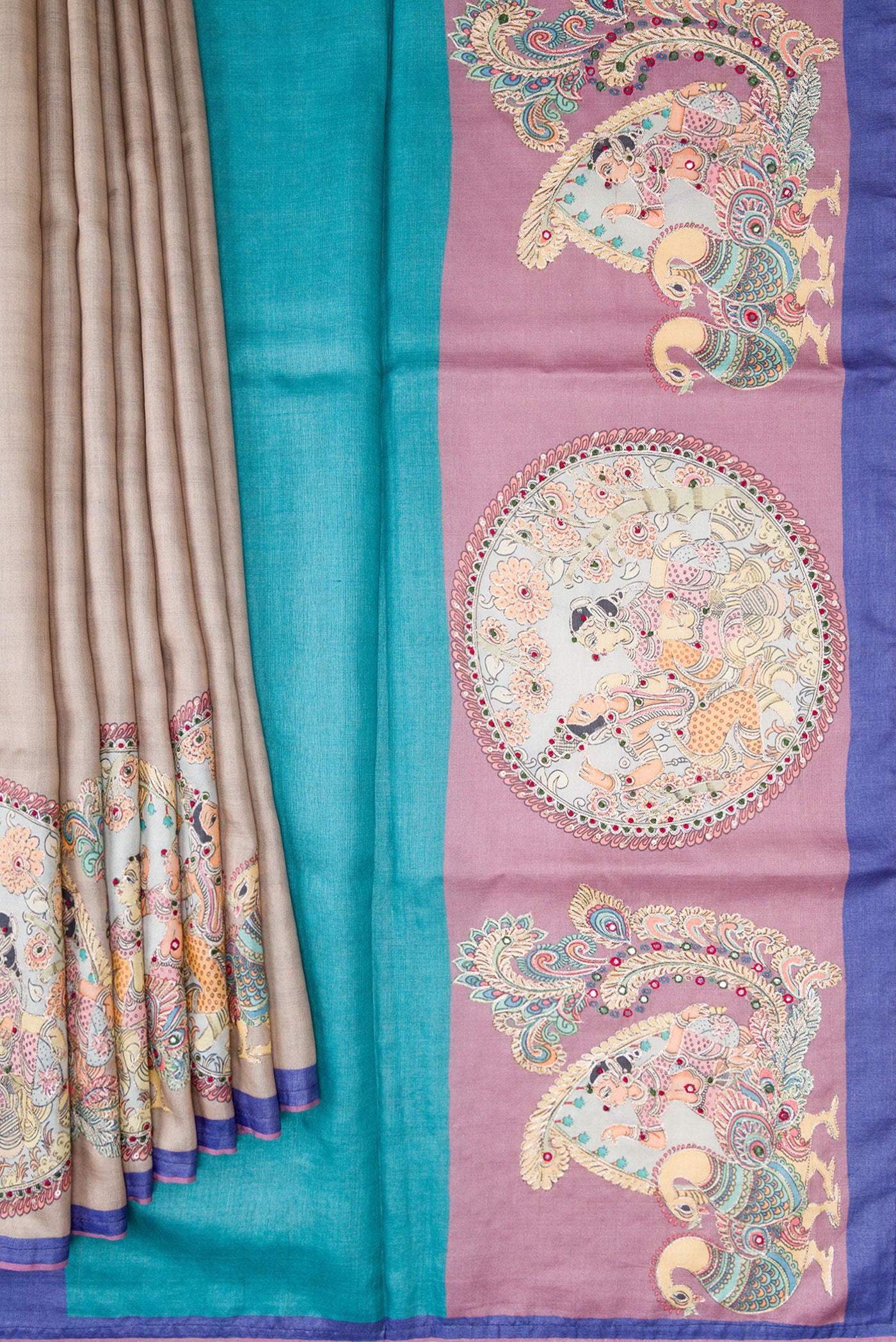 Pleats and pallu of Beige Tussar Silk Saree with Checked design on the body and Plain Border. 
