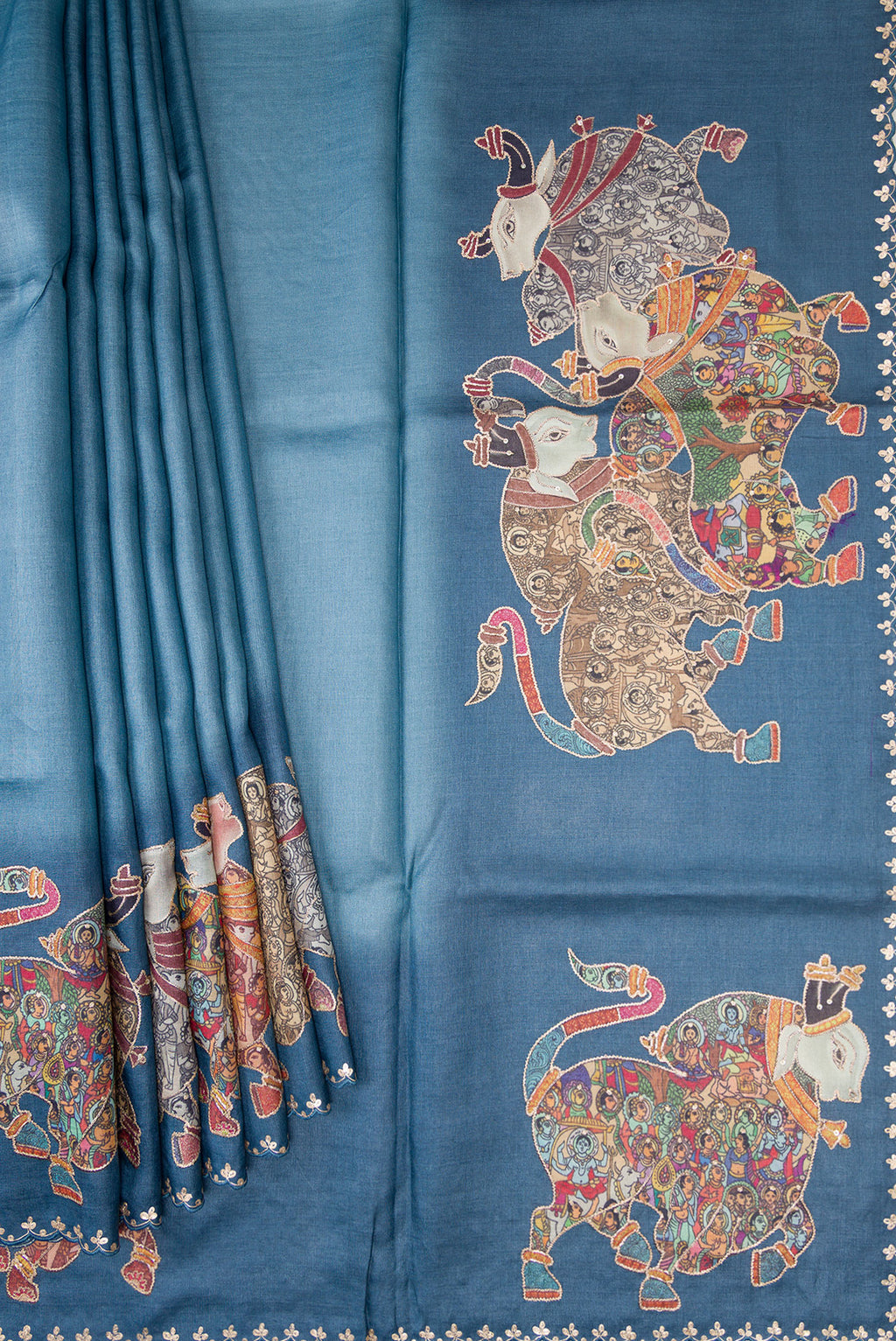 Pleats and pallu of Blue Grey Tussar Silk Saree with Plain Body and Fancy Border. 