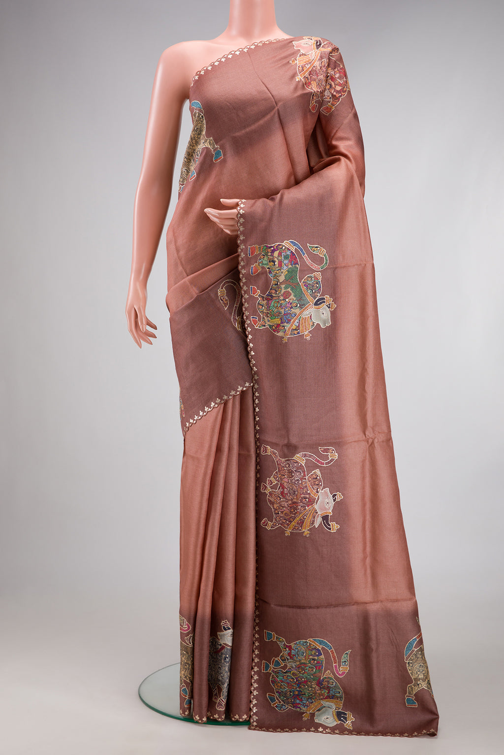Rose Gold Tussar Silk Saree with Plain Body and Embroidery Border.  displayed on a mannequin