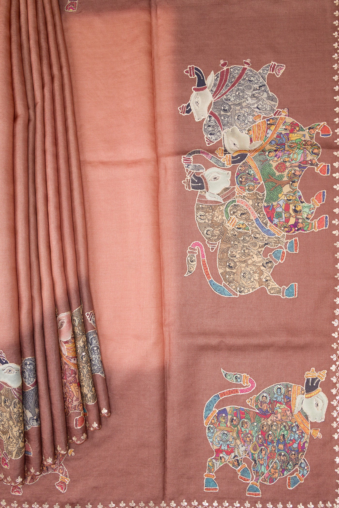 Pleats and pallu of Rose Gold Tussar Silk Saree with Plain Body and Embroidery Border. 