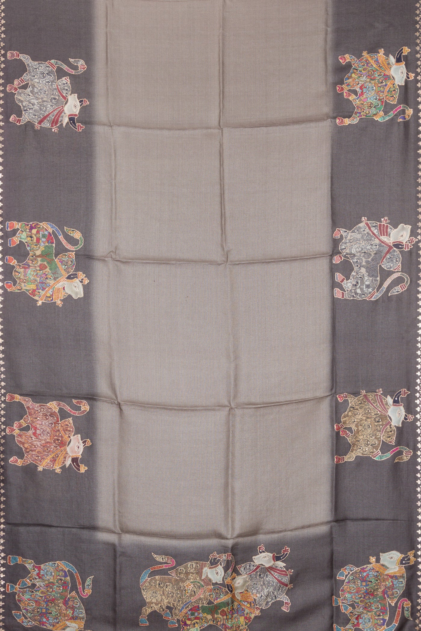 Flat view of Grey Tussar Silk Saree with Plain Body and Embroidery Border. 