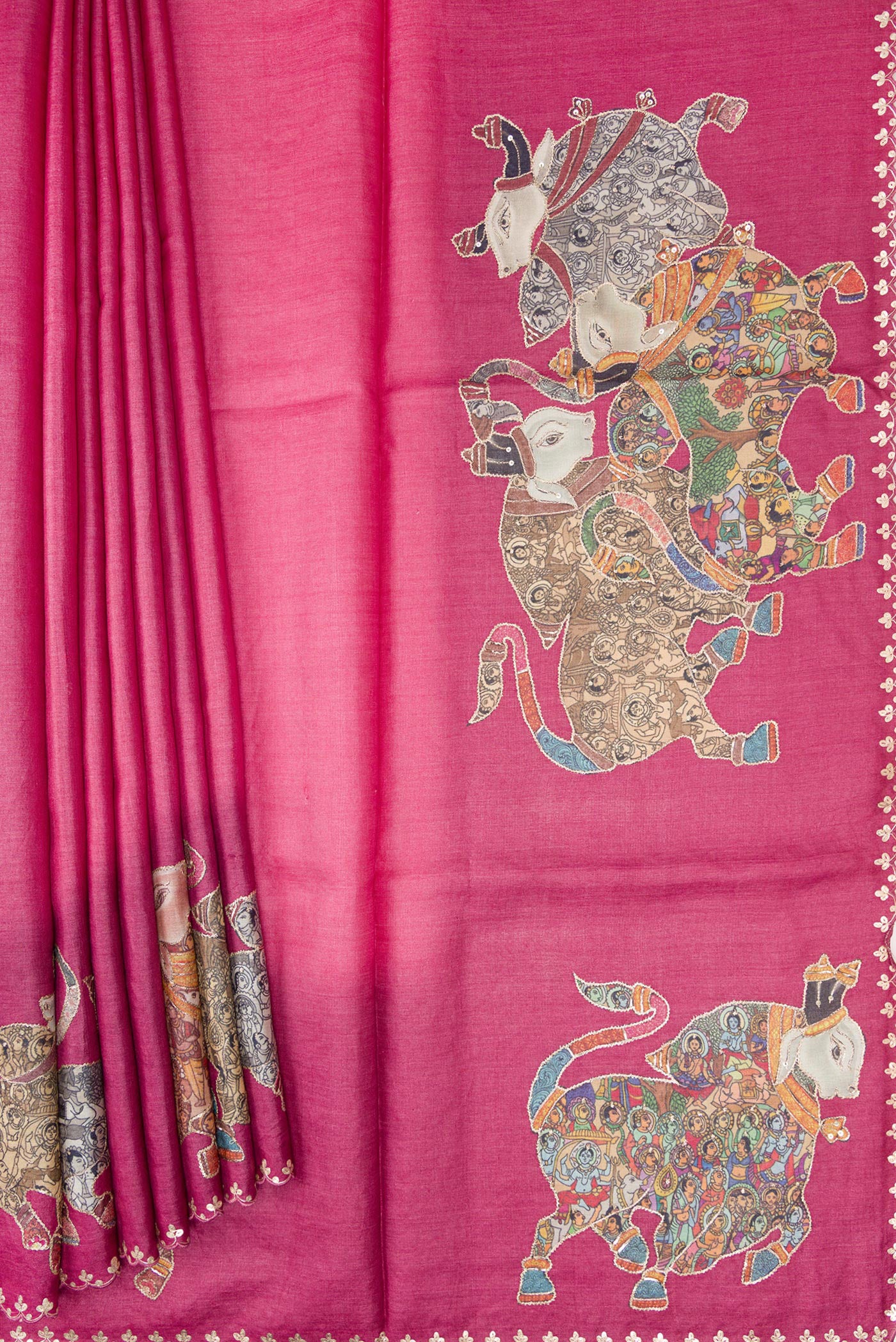 Pleats and pallu of Pink Tussar Silk Saree with Embroidery on the body and Embroidery Border. 