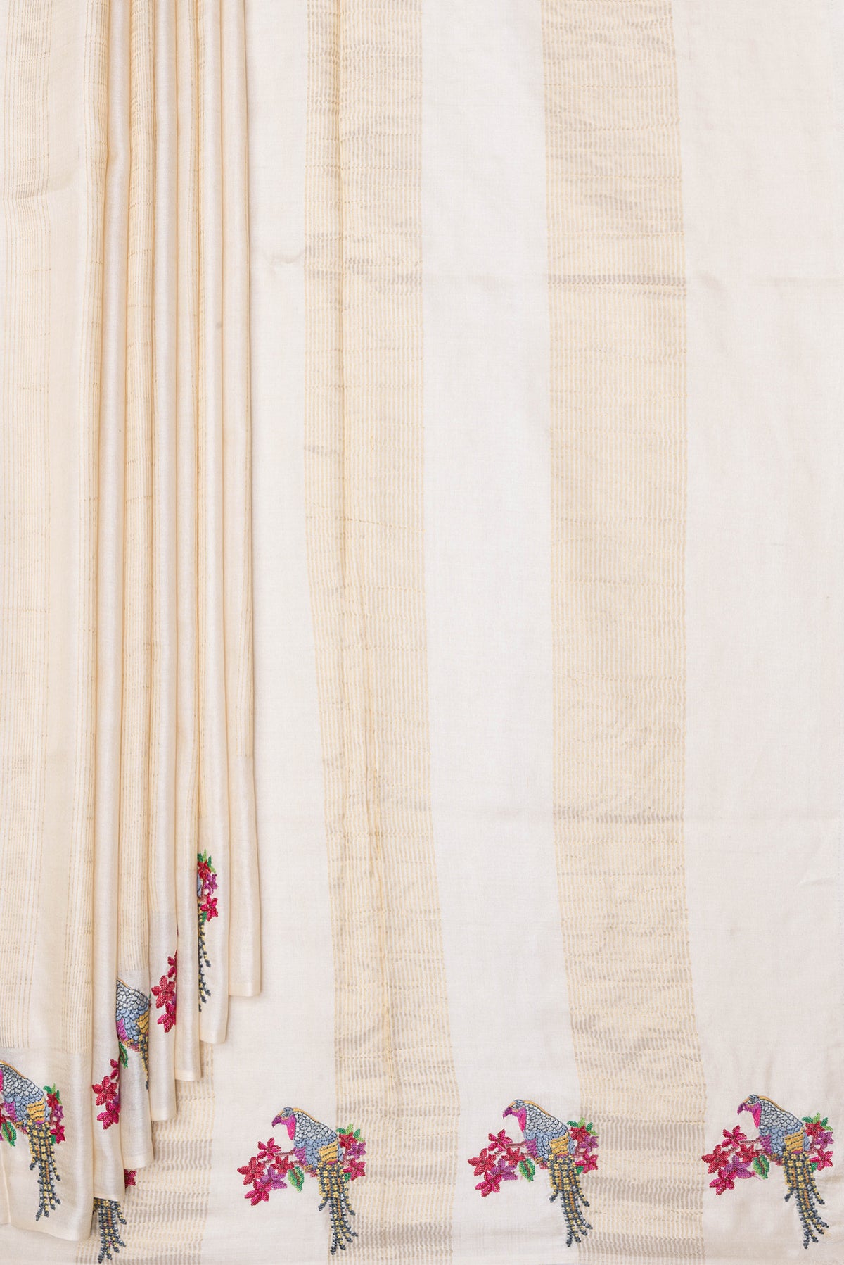 Pleats and pallu of Beige Tussar Silk Saree with Stripes on the body and Fancy Border. 
