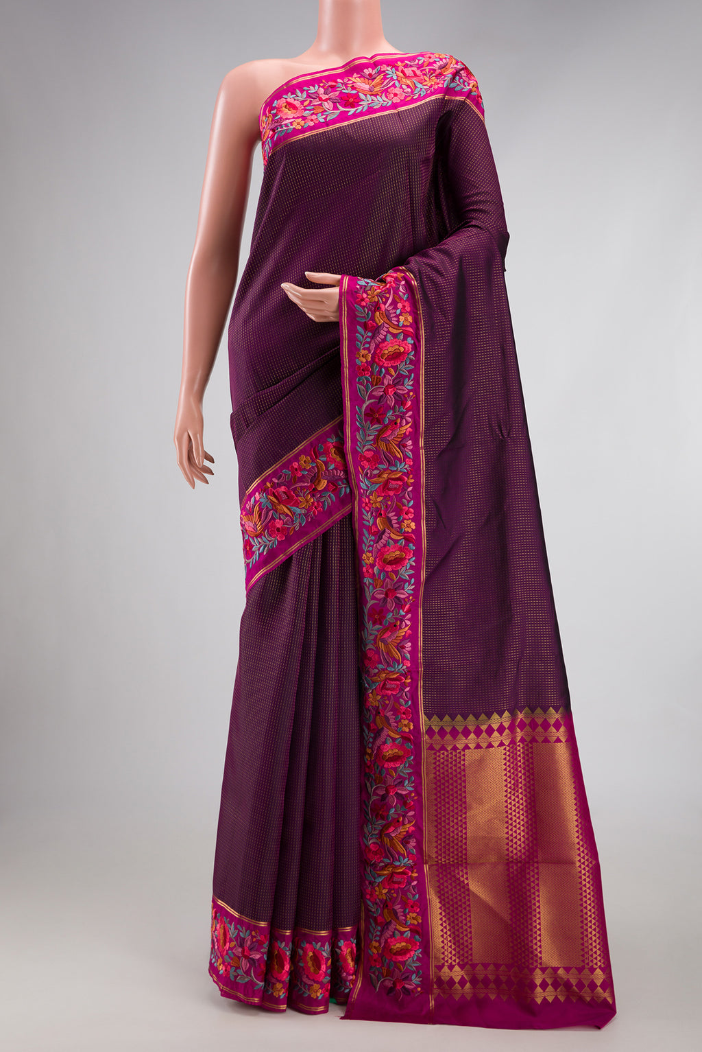 Burgundy Dual Tone Banarasi Silk Saree with Stripes on the body and Embroidery Border.  displayed on a mannequin