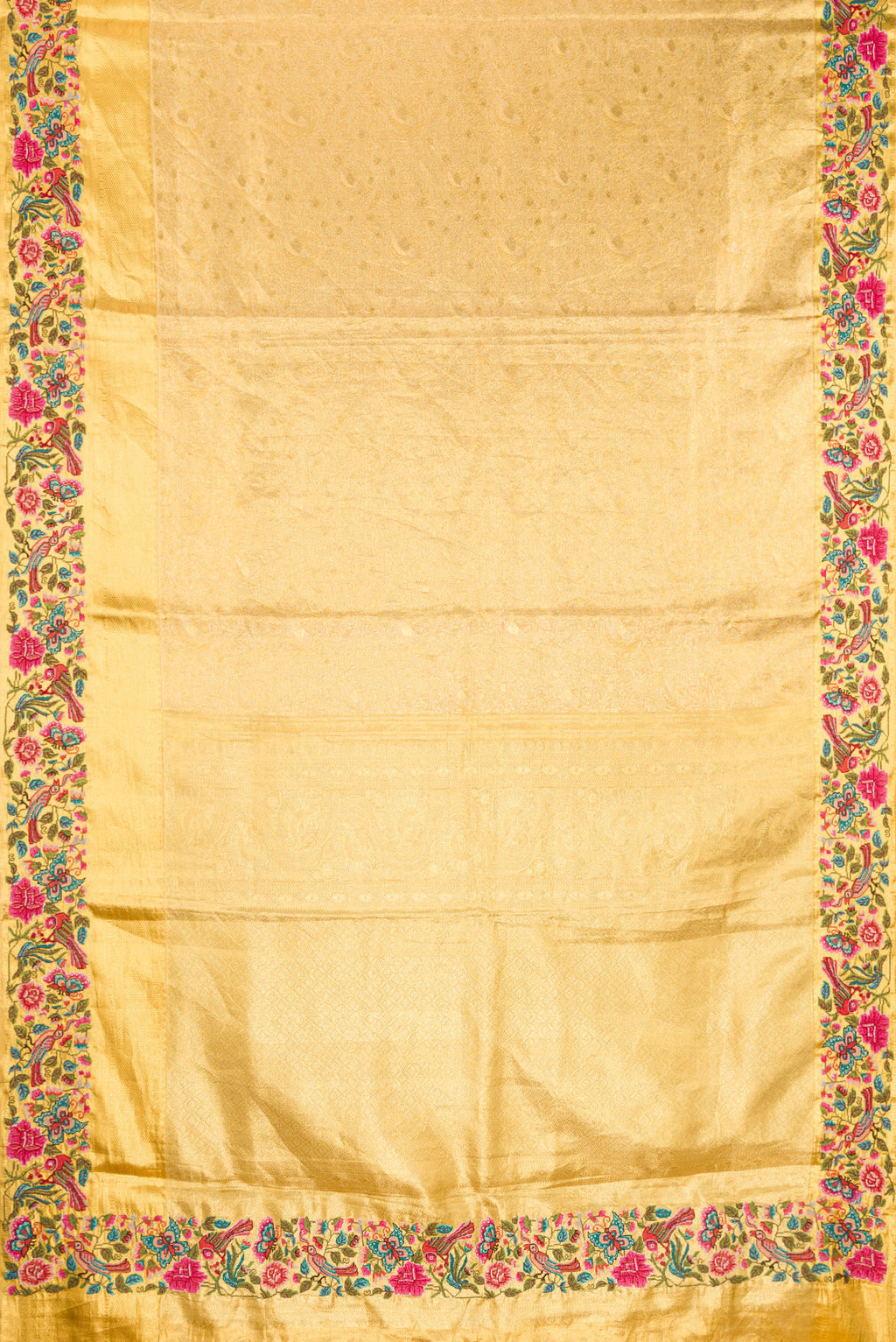 Flat view of Gold Dual Tone Kanjivaram Tissue Silk Saree with Zari Brocade on the body and Embroidery Border. 