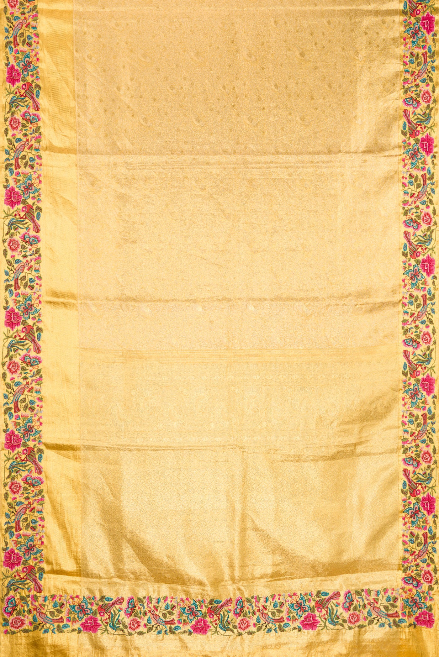 Flat view of Gold Dual Tone Kanjivaram Tissue Silk Saree with Zari Brocade on the body and Embroidery Border. 