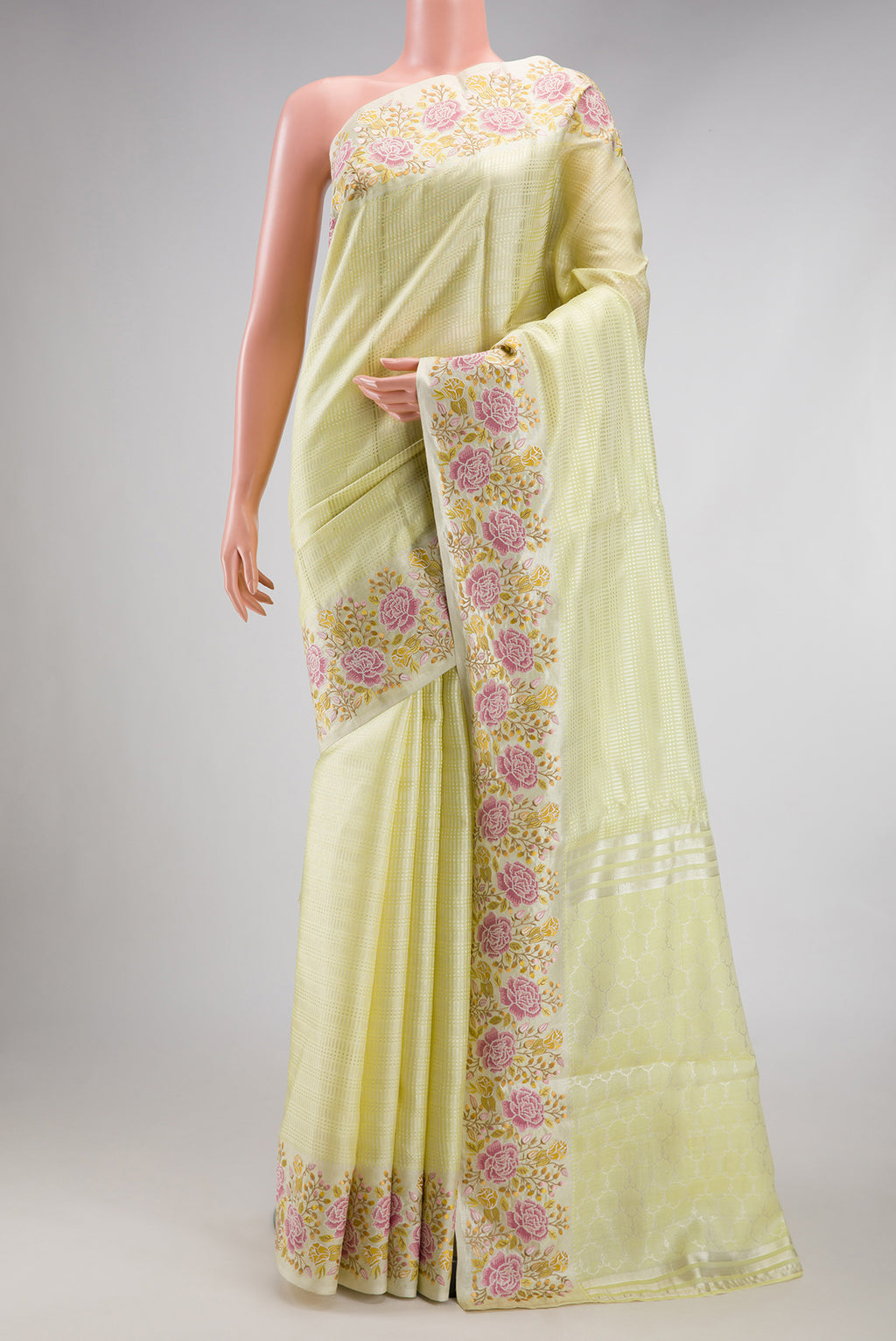 Pista Green Dual Tone Banarasi Silk Saree with Zari Brocade on the body and Embroidery Border.  displayed on a mannequin