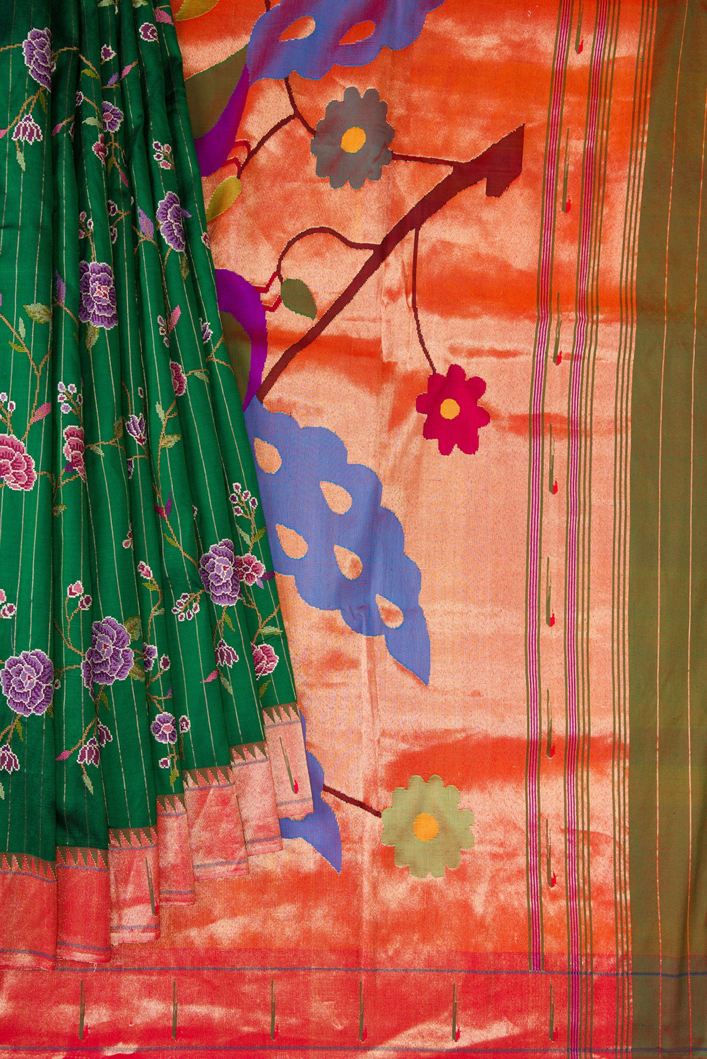Pleats and pallu of Green Paithani Silk Saree with Embroidery on the body and Paithani Border. 