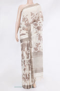 Off White Tussar Silk Saree with Printed design on the body and Zari And Thread Border.  displayed on a mannequin