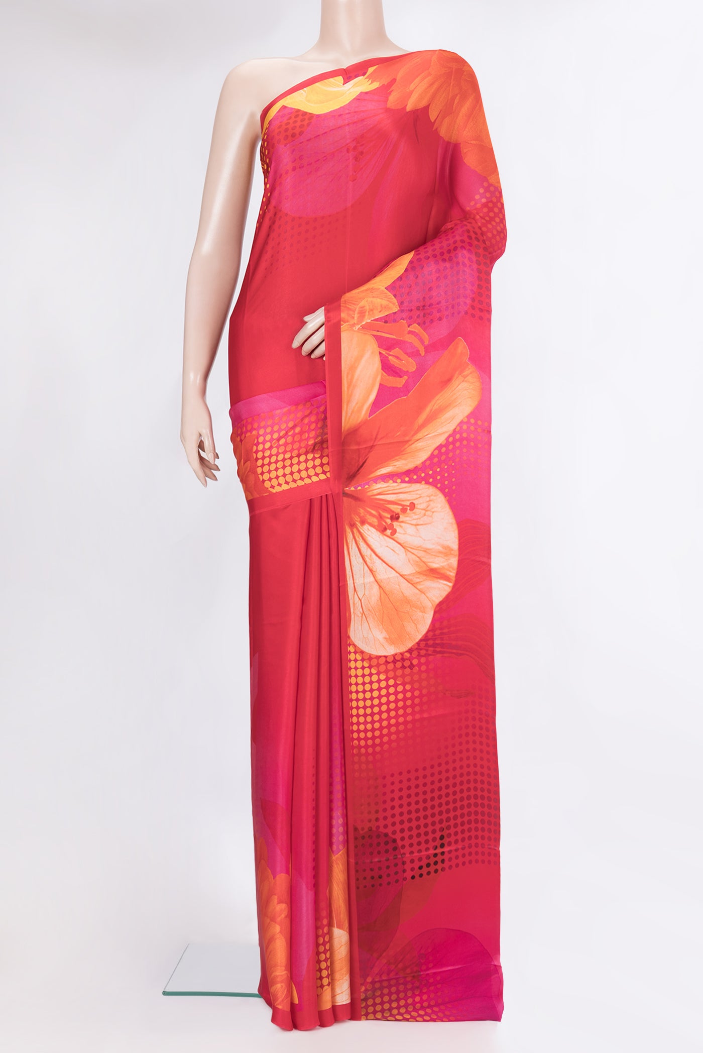 Dark Pink Crepe Saree with Printed design on the body and Plain Border.  displayed on a mannequin