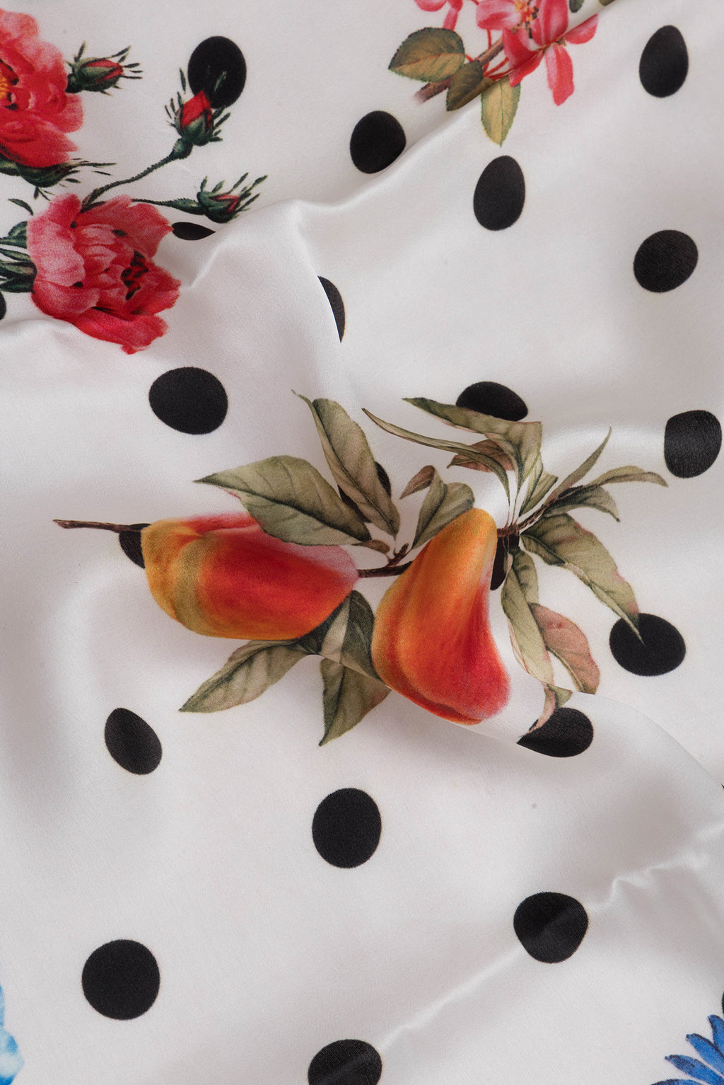 Close up of White Crepe Saree with Polka Dots on the body and Without Border.  displaying folds