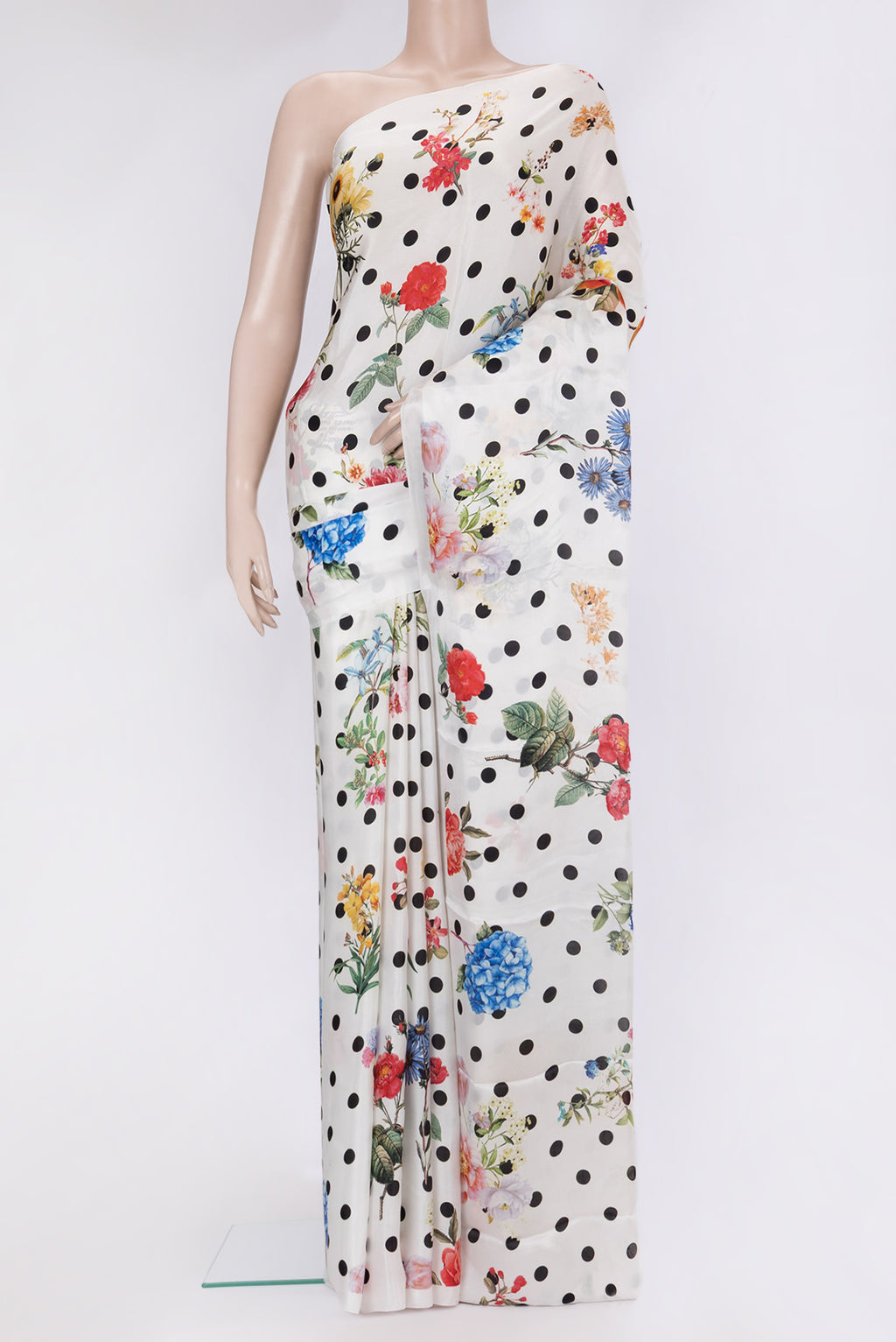 White Crepe Saree with Polka Dots on the body and Without Border.  displayed on a mannequin