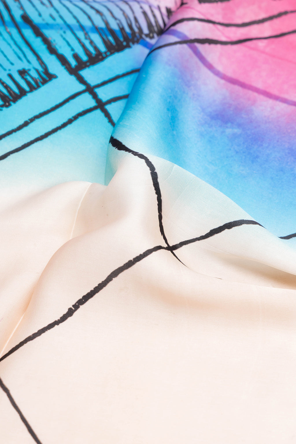 Close up of Multi Color Crepe Saree with Printed design on the body and Without Border.  displaying folds