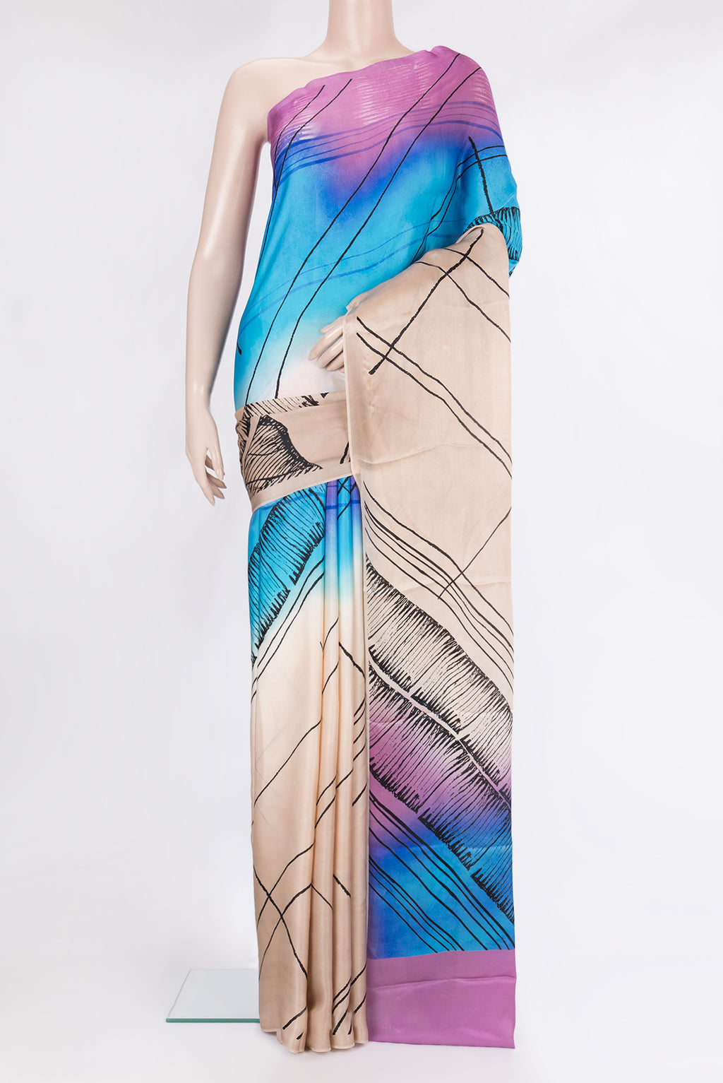 Multi Color Crepe Saree with Printed design on the body and Without Border.  displayed on a mannequin