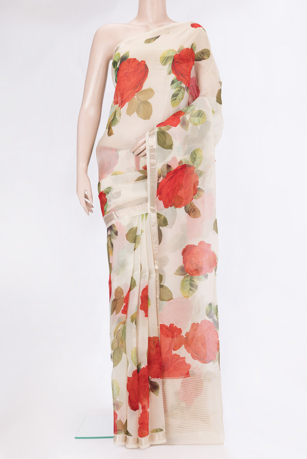 Beige Organza Silk Saree with Floral Print on the body and Zari Border.  displayed on a mannequin