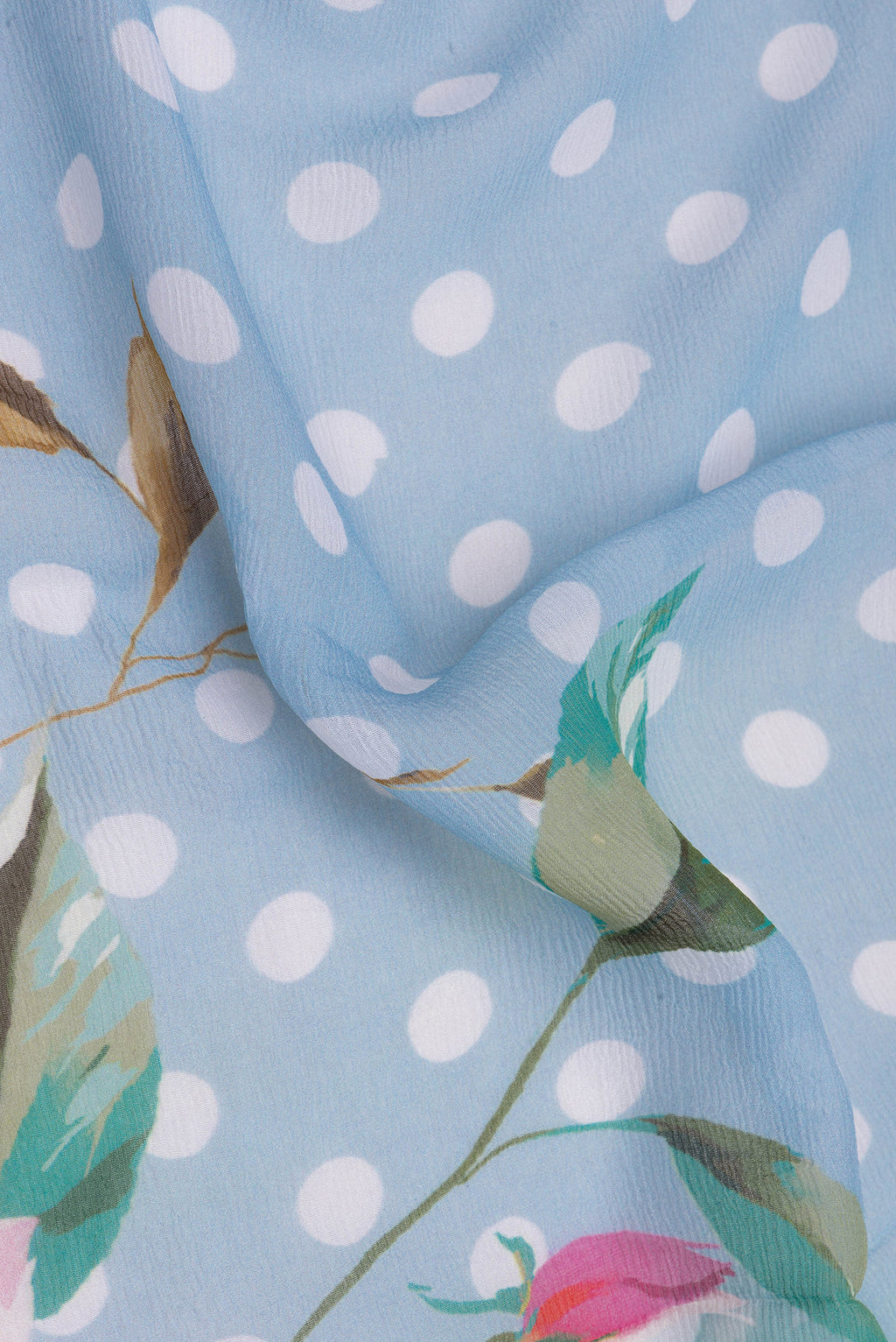 Close up of Light Blue Chiffon Saree with Printed design on the body and Without Border.  displaying folds