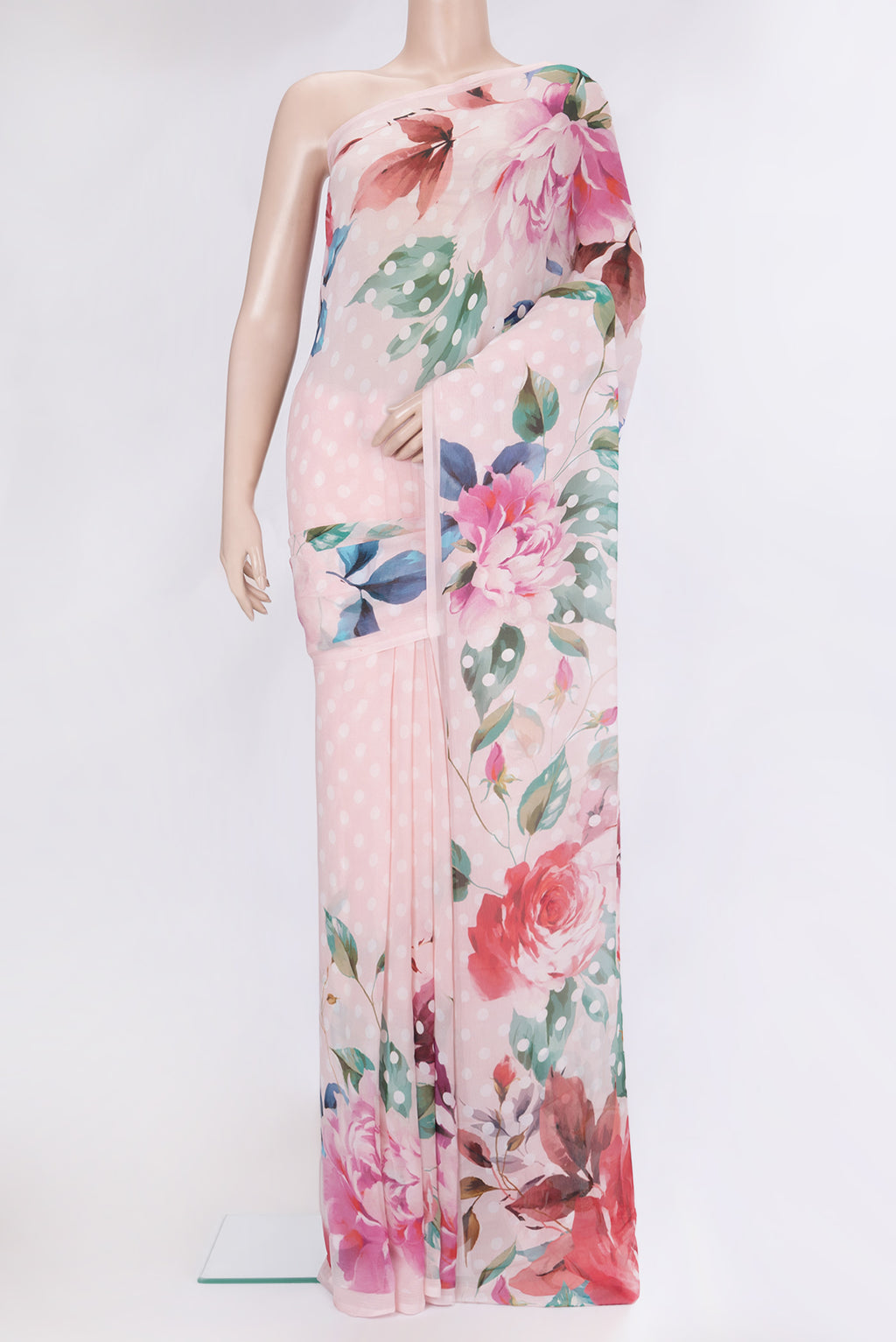 Golden Peach Chiffon Saree with Printed design on the body and Without Border.  displayed on a mannequin