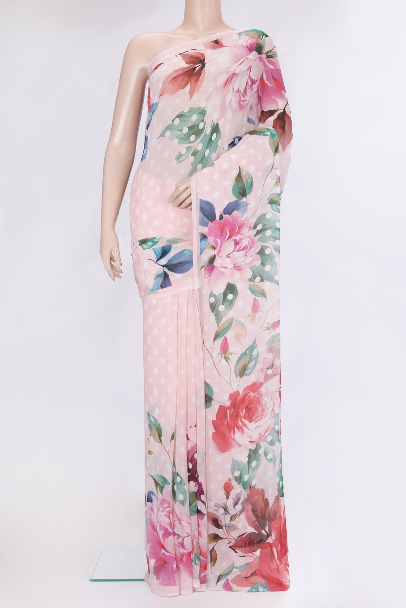 Golden Peach Chiffon Saree with Printed design on the body and Without Border.  displayed on a mannequin