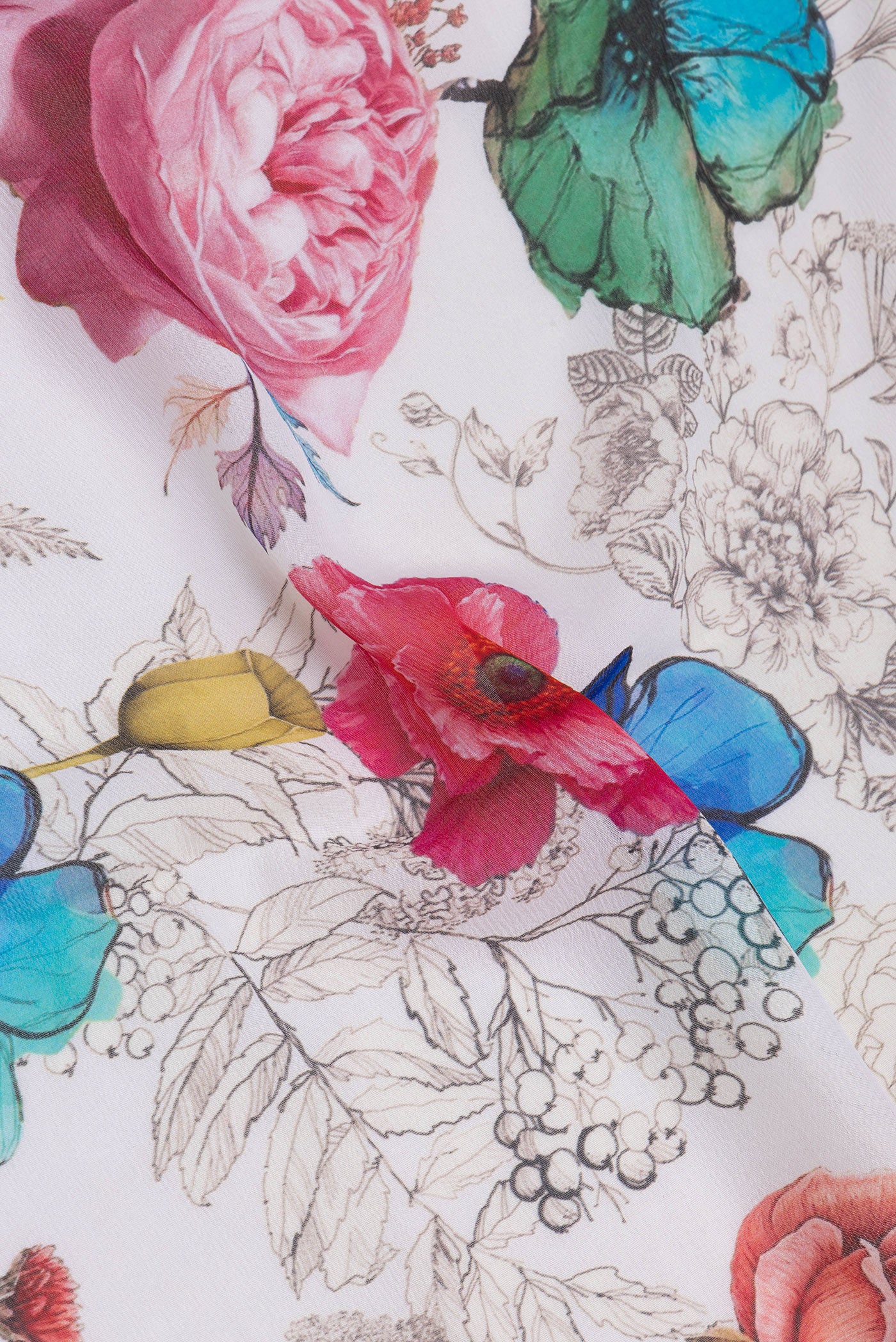 Close up of Off White Chiffon Saree with Floral Print on the body and Without Border.  displaying folds