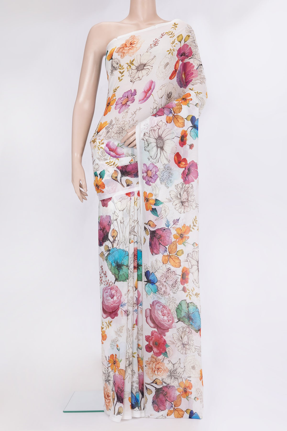 Off White Chiffon Saree with Floral Print on the body and Without Border.  displayed on a mannequin