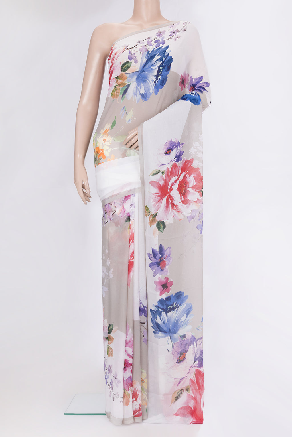 Grey Chiffon Saree with Printed design on the body and Without Border.  displayed on a mannequin