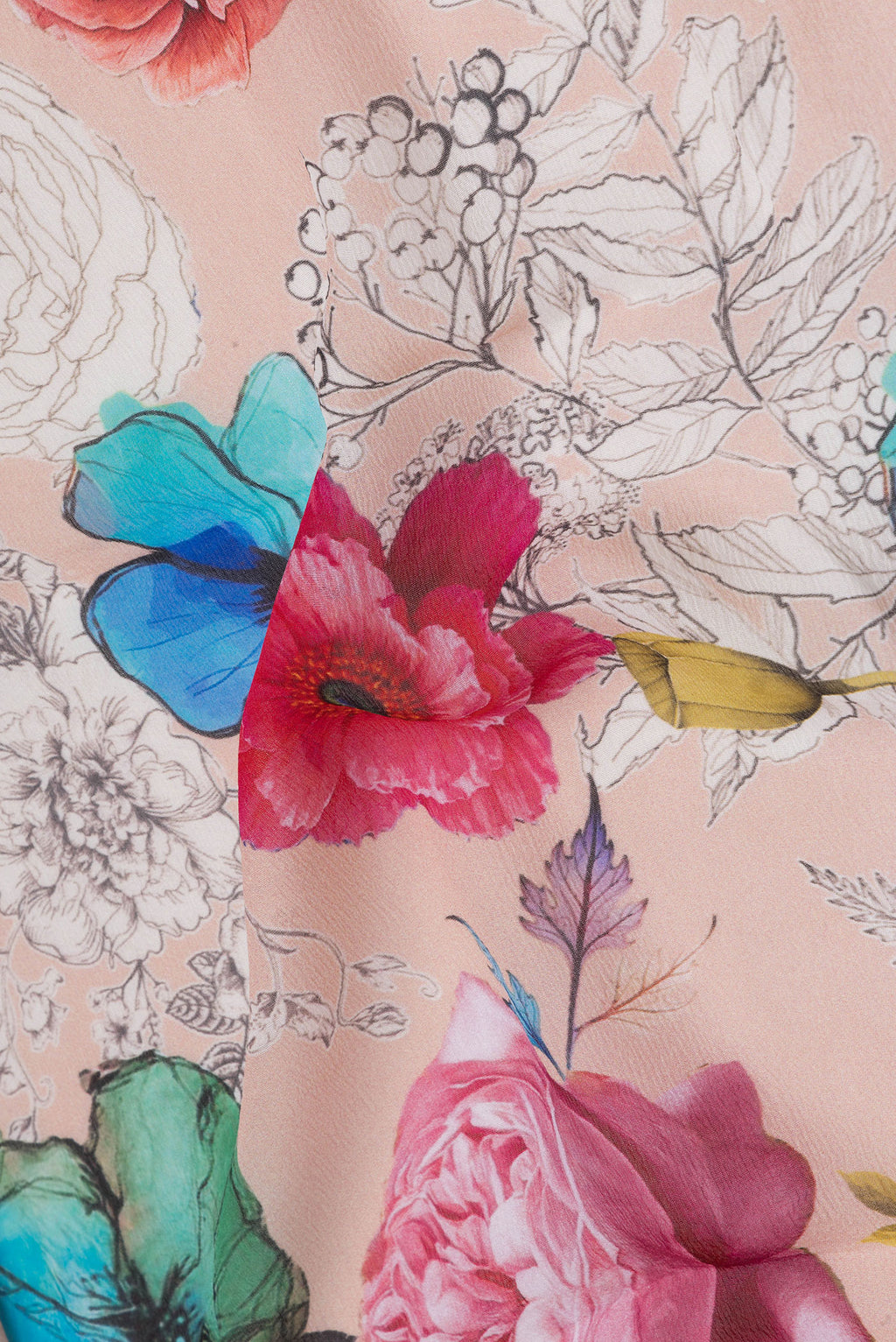 Close up of Peach Chiffon Saree with Printed design on the body and Without Border.  displaying folds