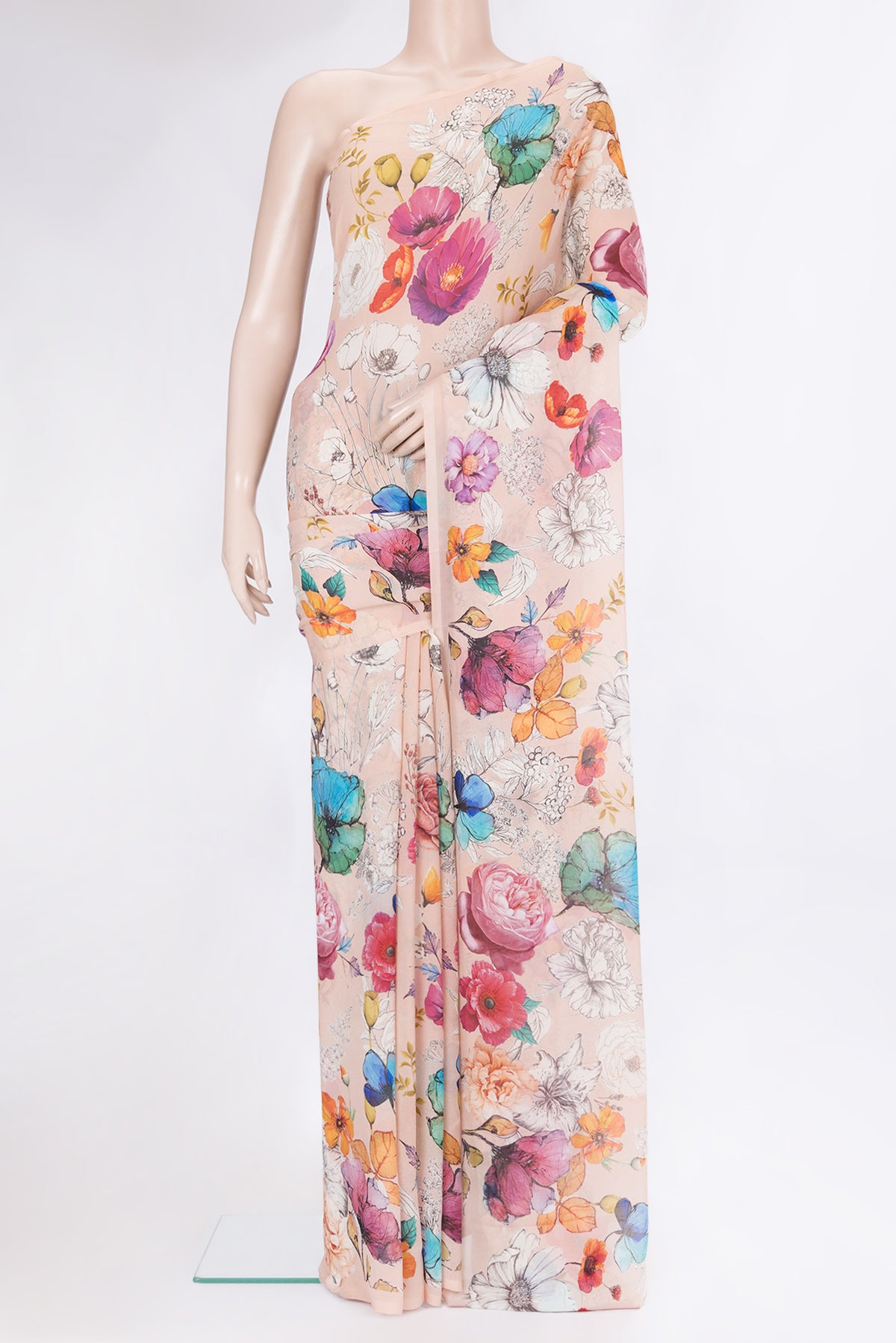Peach Chiffon Saree with Printed design on the body and Without Border.  displayed on a mannequin
