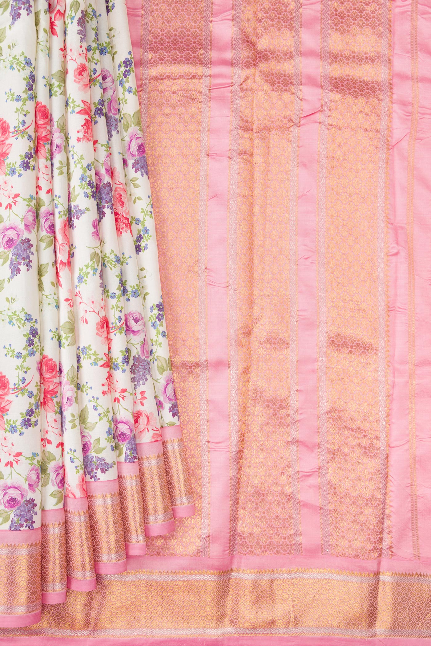 Pleats and pallu of Off White Kanchipuram Silk Saree with Floral Print on the body and Zari Border. 