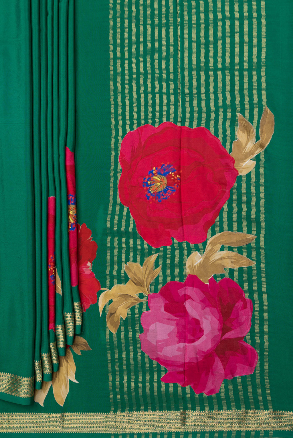 Pleats and pallu of Green Crepe Saree with Plain Body and Zari Border. 