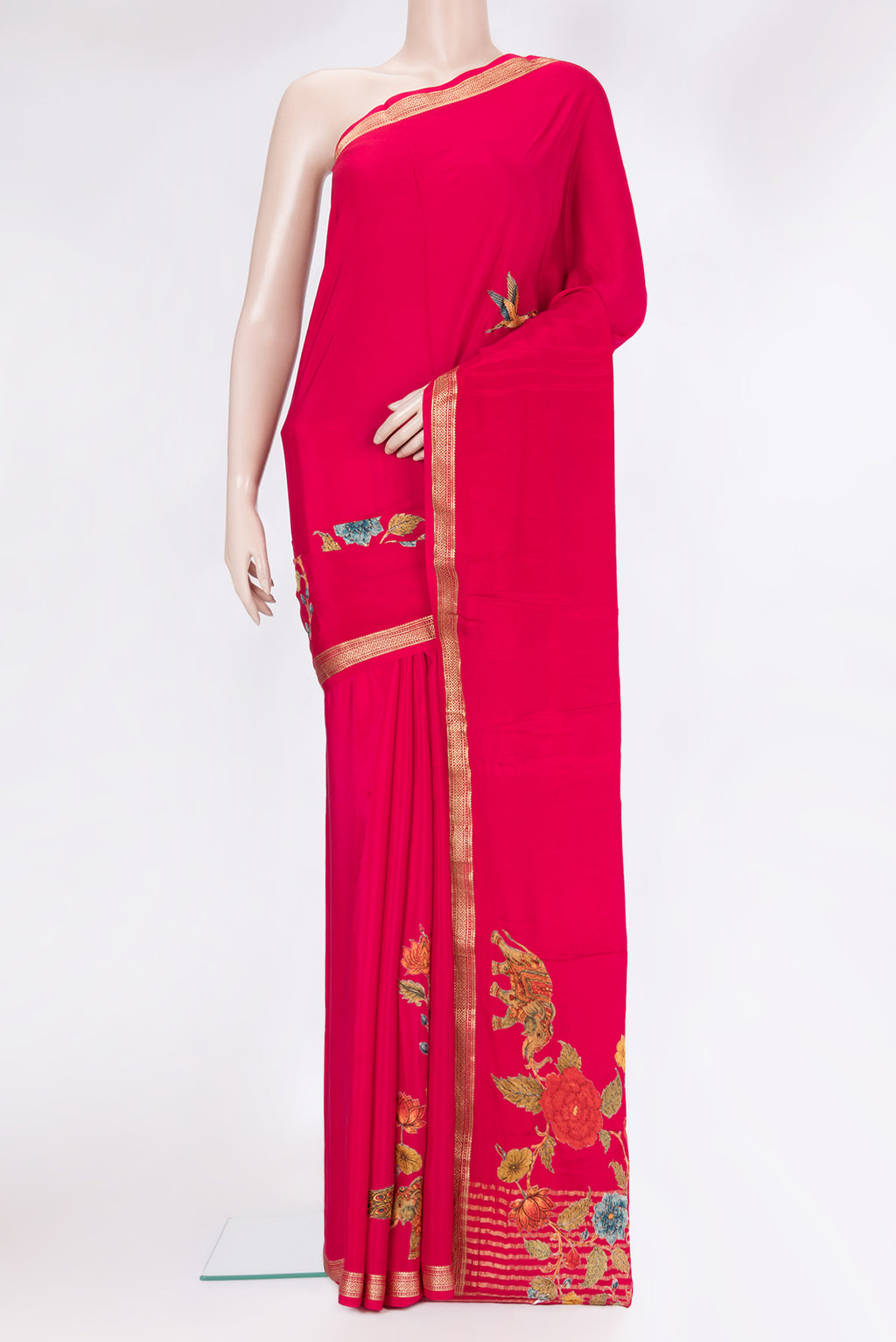 Dark Pink Crepe Saree with Embroidery on the body and Zari Border.  displayed on a mannequin