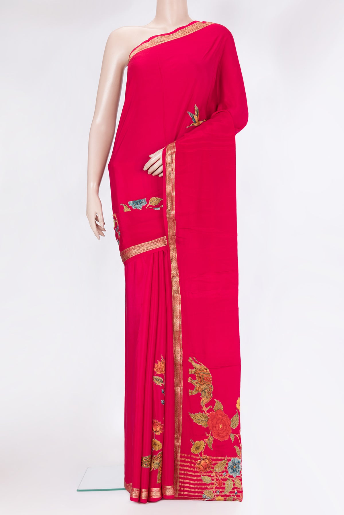 Dark Pink Crepe Saree with Embroidery on the body and Zari Border.  displayed on a mannequin