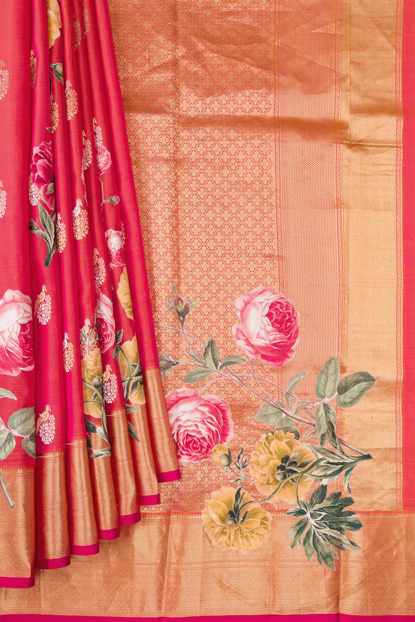 Pleats and pallu of Coral Dual Tone Kanjivaram Silk Saree with Zari Butta on the body and Fancy Border. 