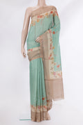 Pure Silk Light Green Dual Tone Tussar Saree with Embroidery on the body and Fancy Border.  displayed on a mannequin