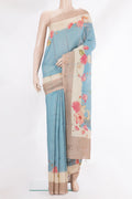 Pure Silk Sky Blue Dual Tone Tussar Saree with Embroidery on the body and Fancy Border.  displayed on a mannequin