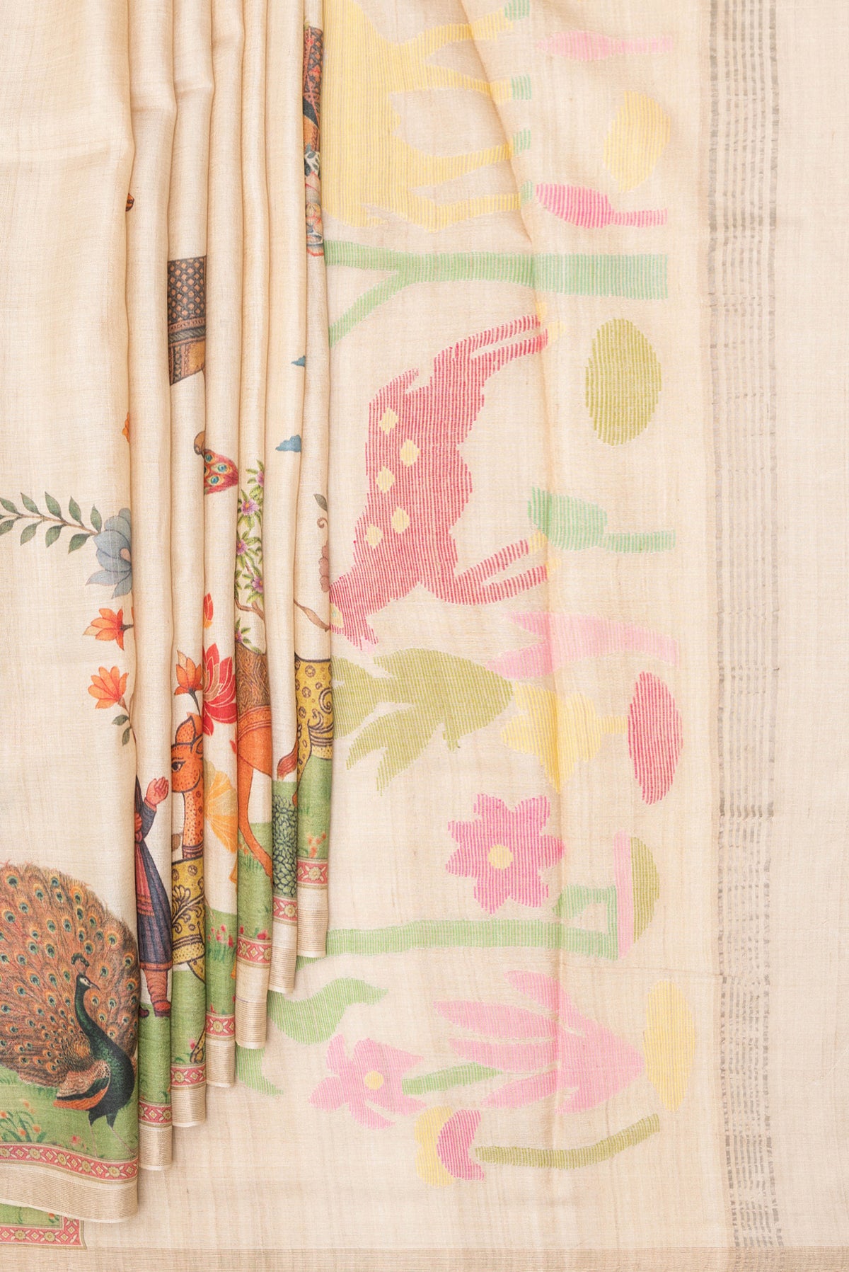 Pleats and pallu of Pure Silk Beige Dual Tone Tussar Saree with Printed design on the body and Fancy Border. 