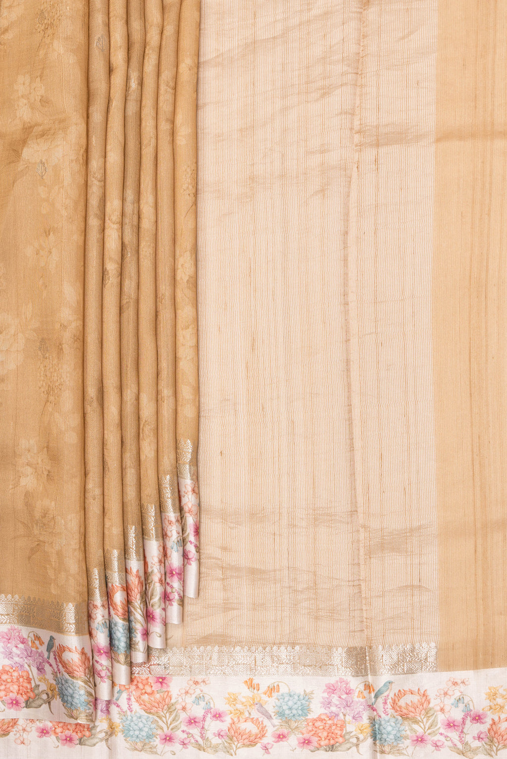 Pleats and pallu of Pure Silk Sandal Tussar Saree with Floral Print on the body and Fancy Border. 