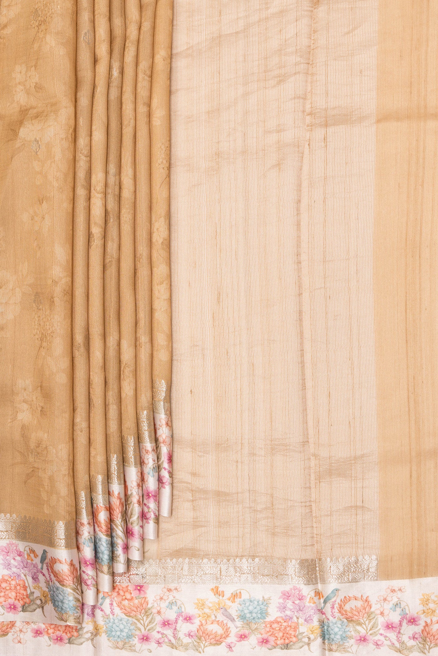 Pleats and pallu of Pure Silk Sandal Tussar Saree with Floral Print on the body and Fancy Border. 