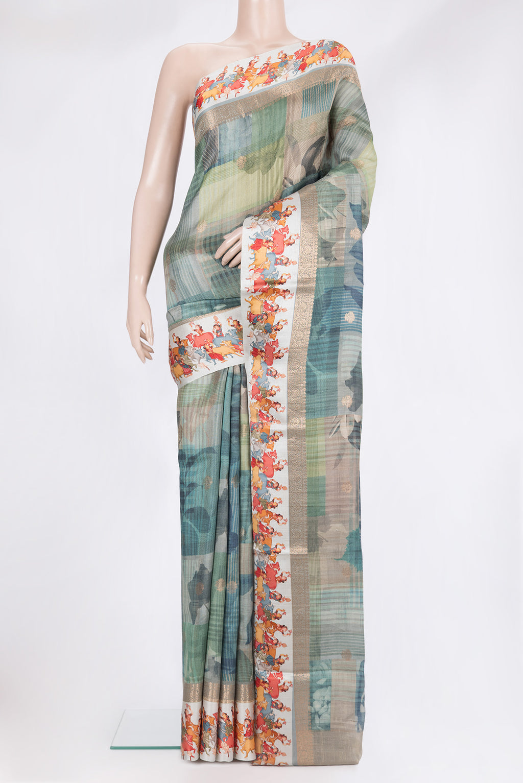 Pure Silk Multi Color Tussar Saree with Printed design on the body and Fancy Border.  displayed on a mannequin