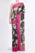 Black Tussar Saree with Printed design on the body and Fancy Border.  displayed on a mannequin