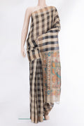 Multi Color Tussar Saree with Checked design on the body and Zari Border.  displayed on a mannequin
