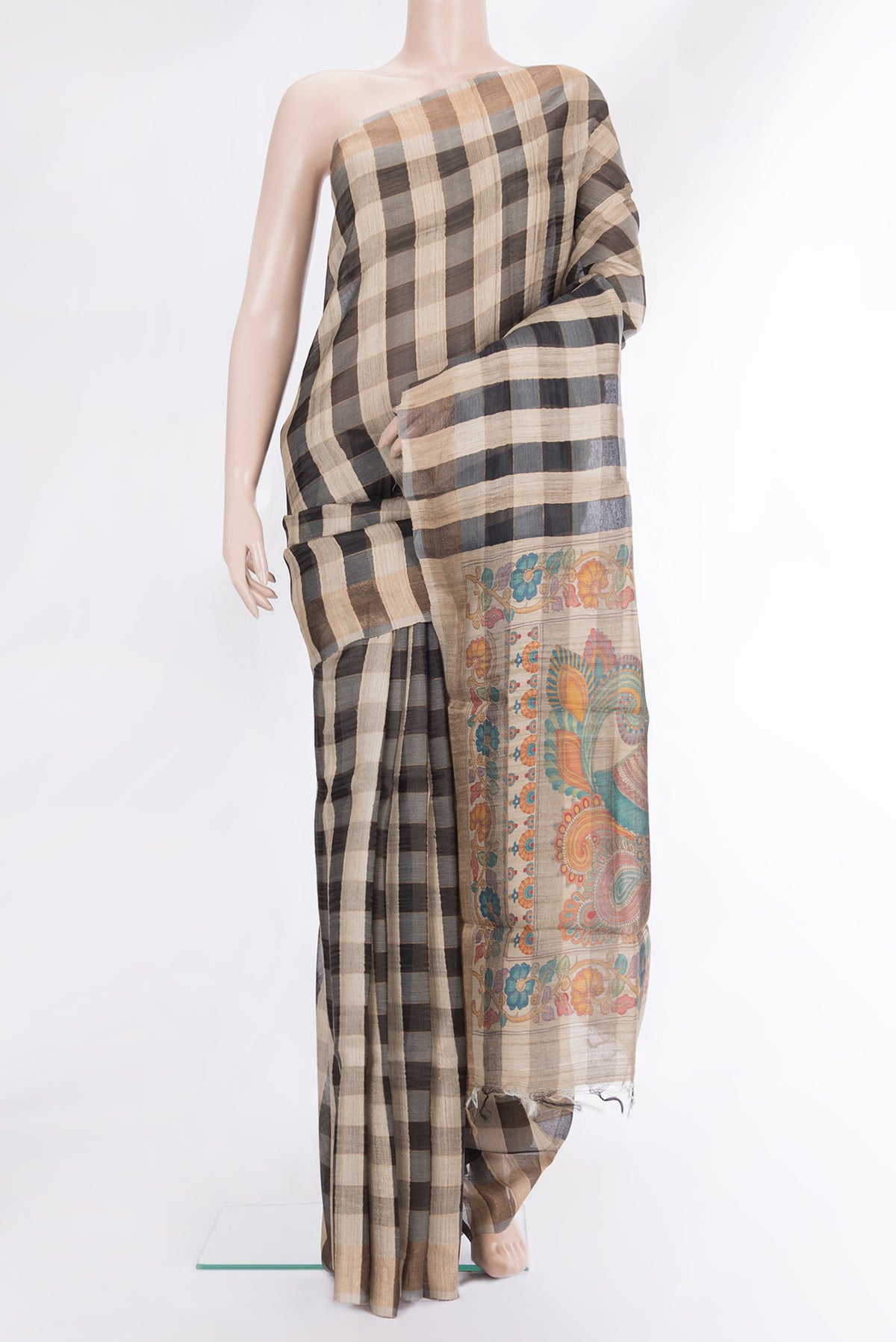 Multi Color Tussar Saree with Checked design on the body and Zari Border.  displayed on a mannequin